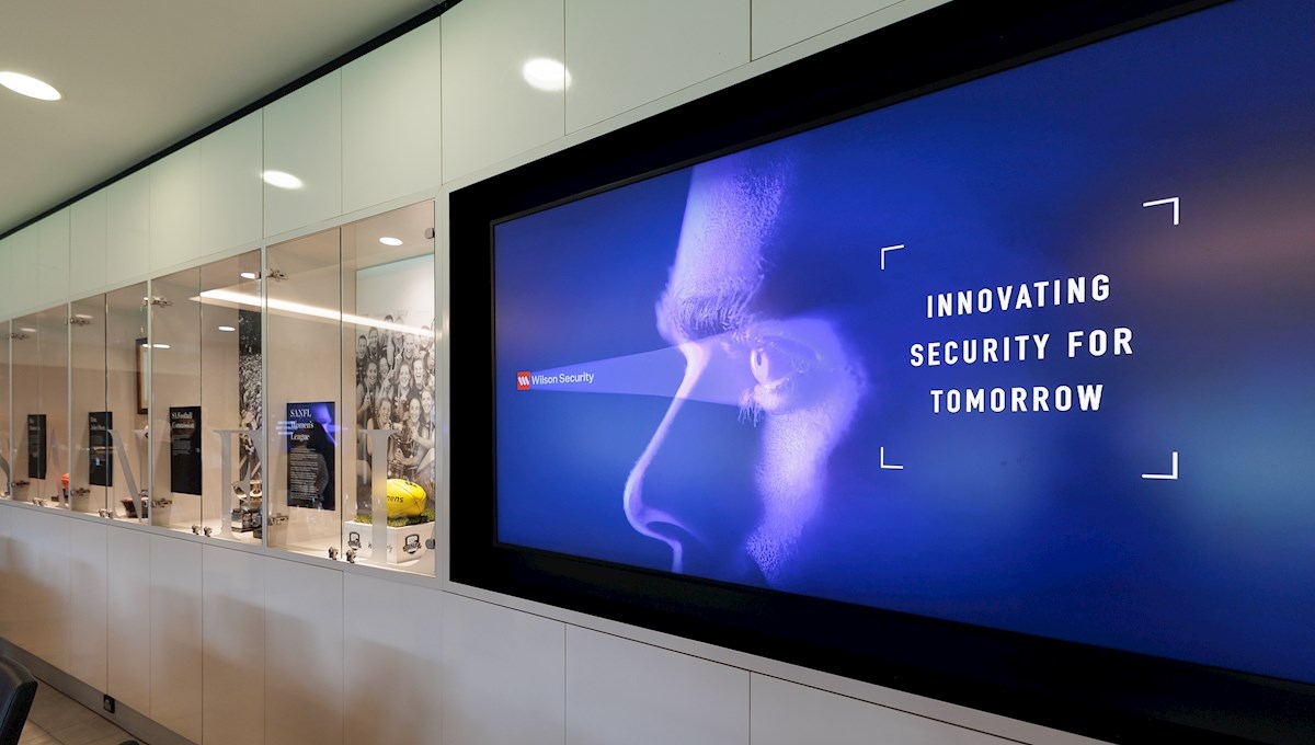 Symposium poster on a large screen